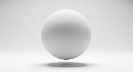 A pristine white sphere floating weightlessly against a seamless white background.