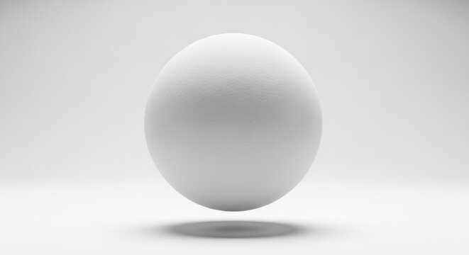 A pristine white sphere floating weightlessly against a seamless white background.