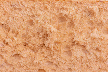 The middle of a cut bread as a background macro photo.