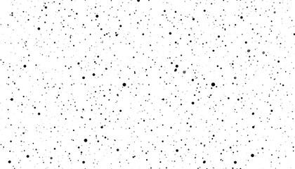 Black specks uniformly scattered against a pristine white background, creating a speckled pattern