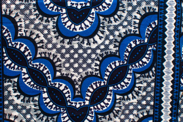 close up view of blue ankara fabric, different patterns on blue ankara material, flatlay of nigerian wax cloth