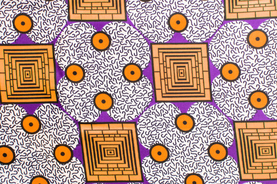 top view of white ankara fabric, flatlay of nigerian wax cloth with designs, spread out white ankara material