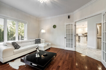 Exterior and interior of a modern Canad house with backyard, driveway, and complete living spaces. Includes living room, kitchen, bedrooms, bathrooms, hallways and basement