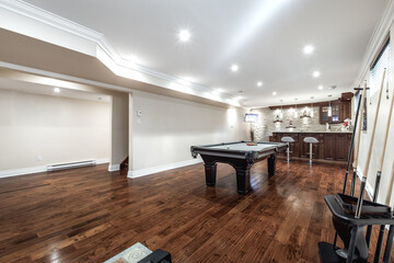 Exterior and interior of a modern Canad house with backyard, driveway, and complete living spaces. Includes living room, kitchen, bedrooms, bathrooms, hallways and basement