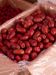 Deep red jujubes in the cardboard box