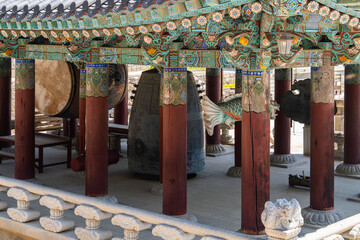 old bell house with a big bell and a drum in a Buddhist temple