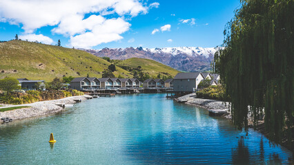 Fototapeta premium cromwell pisa mooring sunny day landscape blue water new zealand idyllic lake dunstan