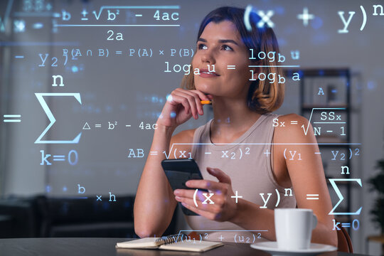 Smiling businesswoman in casual wear holding using smartphone typing at office workplace with notebook. Concept of distant work, business education. Math icons hologram