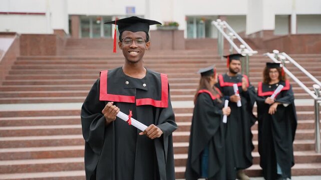 Proud African American student celebrating graduation day