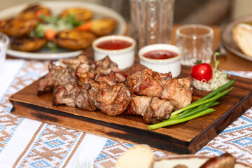 Grilled Kebab on Wooden Board