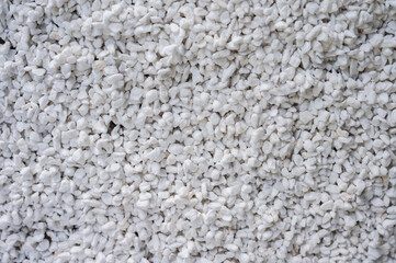 Full frame shot of Perlite texture and background. It improves aeration and drainage, which helps prevent root rot and encourages strong root growth.