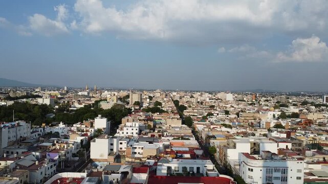 Dolly out view of the east of the Colonia Americana and the Templo Expiatorio. Guadalajara, Jalisco, Mexico