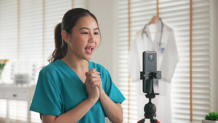 Young adult woman Gen Z asia people anti aging expert modern nurse live talk viral video selfie...