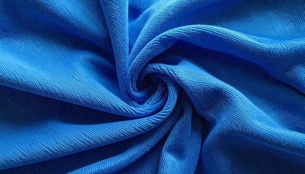 Close-up of a vibrant blue fabric, swirled and textured - Powered by Adobe