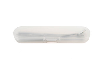 Transparent plastic case with dental tweezers inside.