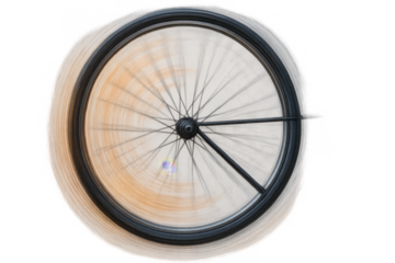 Bicycle wheel spinning fast, motion blur effect creating dynamic rotation, isolated on transparent background