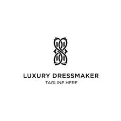 Obraz premium Elegant Luxury Dressmaker Logo Design with Intricate Monogram Symbol.