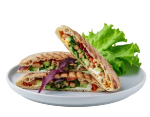 Freshly Grilled Pita Sandwich Stuffed with Colorful Vegetables and Lean Protein on a White Plate