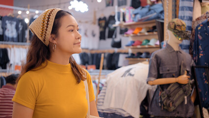 Young Gen Z teen asia female happy travel smile looking at zero waste eco go green buy second hand...