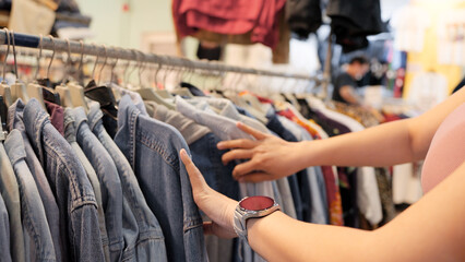 Young teen tourist Gen Z asia female choose look at zero waste eco go green buy second hand sale...