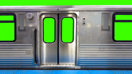 Close-up of the stainless steel side of a transit train car, showing the doors and windows filled with bright green screen for easy keying and compositing.