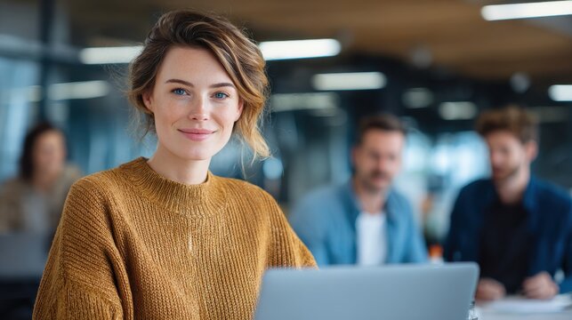 Attractive confident woman sitting at laptop in modern office, new outfit, different posture, colleagues discussing projects, professional business environment, teamwork, corporate office