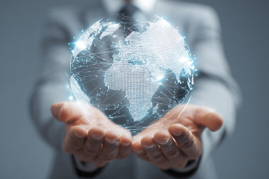 Businessman Holding a Digital Holographic Earth Globe with Connectivity Lines