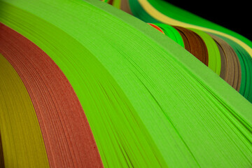 Countless paper stacks, soft curves, colorful hues, various shapes, strong textures, much like ribbons, silk, or lollipops, balloons, perfect graphic design templates