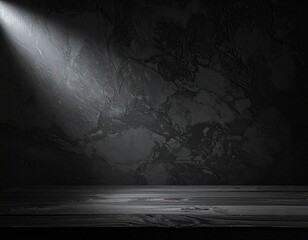 黒い壁に斜め上からぼんやりとした光が差し込んでいる