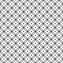 Black and white geometric pattern of interlocking circles and dots
