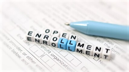 Annual open enrollment concept for enrolling in to health, dental, and vision insurance company benefits.