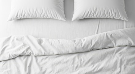 Clean white bedding with duvet and pillows overhead view
