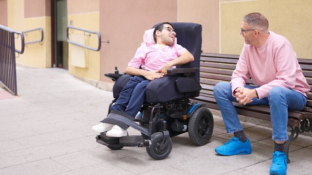Men having a conversation promoting inclusion and accessibility