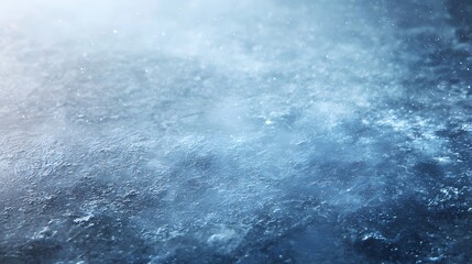 Textured frozen surface displays cold blue and white tones with subtle sparkling elements