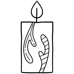 christmas Festive candle with candy cane design and warm glow.