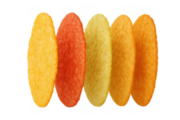 Colorful puffed snacks standing upright, creating a vibrant line of crunchy lentil and veggie chips