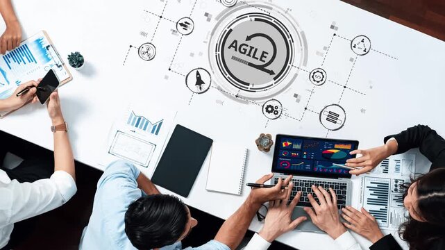 Engaging business meeting showcasing a diverse team collaborating on agile methodologies, using digital tools for data visualization and strategic planning. Raster