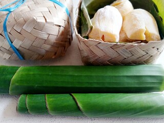 Sweet tape in basket isolated on white background. Tape singkong.
