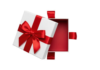 Open white gift box with red ribbon and bow isolated for celebration transparent background