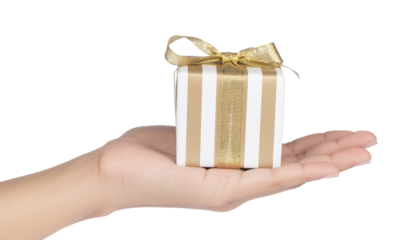 Hand holding a gift box wrapped in striped gold paper and tied with ribbon, symbolising love, celebration, and giving png cutout