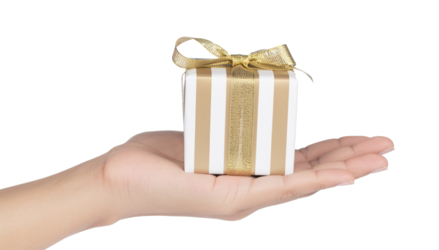Hand holding a gift box wrapped in striped gold paper and tied with ribbon, symbolising love, celebration, and giving png cutout - Powered by Adobe