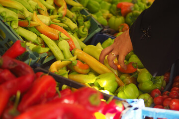 Colorful peppers on display at a fresh market