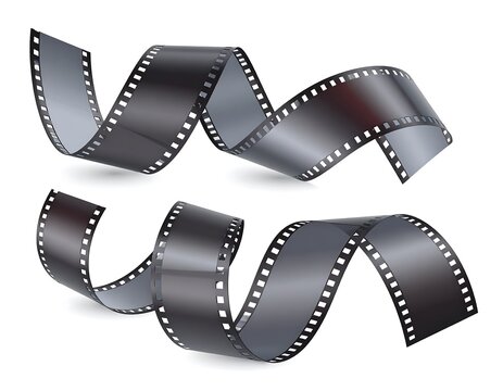 Curled photographic film strips, slightly translucent, against a white background, cast shadow