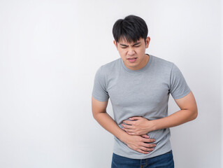 Asian man's expression of stomach ache, stomach acid pain