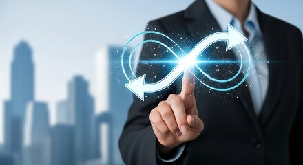 Businessman touching a glowing infinity symbol with arrows, representing the concept of circular economy and sustainability in business