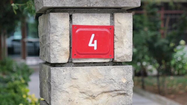 Explore the details of house number four in a serene garden