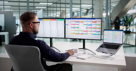 Busy Man Organizing Schedule And Projects