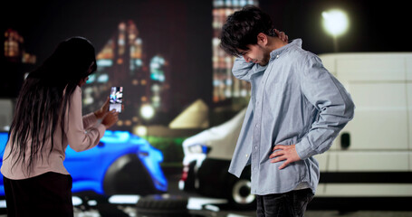 Whiplash: African American Mechanic Inspecting Damaged Car After