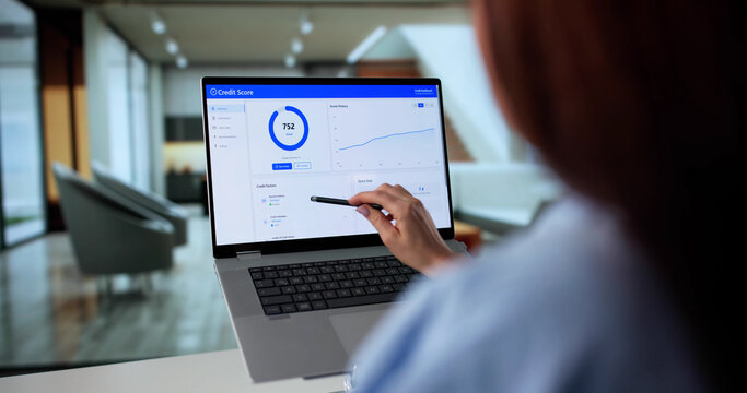 Businesswoman Analyzing Credit Score Rating Online