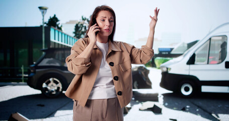 Young Woman In Suit Talking On Smartphone